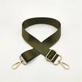 Detail of adjustable military green nylon strap with gold-tone lobster clasps - Army Green