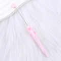Pink DIY beadable pen with cute bow print and metal rod on soft faux fur background - 62-Pink Bow