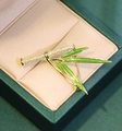 Elegant bamboo-shaped gold brooch with green enamel leaves and sparkling crystals - Pave Green Leaf Bamboo