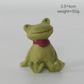 Cute green resin frog figurine with red scarf ornament, sized 3.5x4cm and weighing 50g - Frog