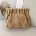 Detail of beige corduroy cosmetic pouch with soft vertical texture and spring closure - No Label Plain / Apricot