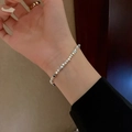 Elegant silver square bead bracelet with a minimalist gold ring on a female wrist - Silver Nuggets Bracelet (S273 Silver) / Silver