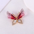 Pink and gold butterfly brooch featuring sparkling crystals and glittery resin wings - Rhinestone KC0182 Red