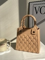 Beige EVA waterproof handbag with diamond lattice quilting and laser cut perforation detail - Khaki