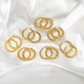 French style 18k gold plated twisted rope hoop earrings on white silk background - Gold 7-Pair Set