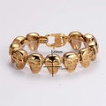 Vista dettagliata delle maglie a teschio in acciaio dorato con dimensioni di 20 mm - Oro Lucido con Chiusura a Scatto (Stile 2 Oro)