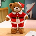 Classic brown teddy bear wearing a red Santa outfit with Christmas hat on wood desk - 48cm / Brown
