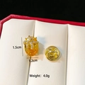 Detail of gold brooch with yellow gemstone and bow design, size 1.5cm x 1.2cm - Bowknot Gemstone (C295)
