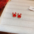 Close-up of festive red reindeer earrings with white rhinestones and a golden heart - 70# Christmas Deer Heart / Red/Gold
