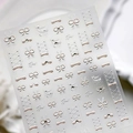 Autocollants 3D pour ongles avec nœuds métalliques argentés et dorés et relief chic - Style de Dentelle à Nœud (TL-343)