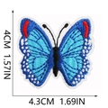 Detailed macro view showing the high-density embroidery texture of the blue butterfly patch - Blue Red Black Butterfly (C19HD-105-31)