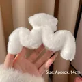 Large white plush hair claw clip for women featuring soft wave faux fur and 14cm size - Pure White