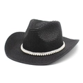 Détail d'un chapeau de cowboy en paille noire avec bande de perles et large bord - M (56-58cm) / Noir