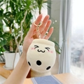 Close-up of a plush bubble tea keychain with embroidered cute face and metal clasp - Squinting Eyes/Gold Buckle / Beige