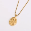 Close-up of vintage embossed Holy Family oval pendant on a gold box chain necklace - Gold Tone With Chain