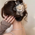 Elegant rose mesh hair claw clip in beige, displayed on a high bun for a bridal look - Champagne Flower Hair Claw
