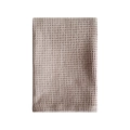 Folded beige waffle weave cotton dish towel on a clean white background - 35*35cm / Brown