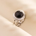 Detail of adjustable silver ring with marble-patterned black stone on beige fabric - Silver With Black Stone / Silver Black (J566-S-B)