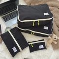 Set da 4 pezzi organizer da viaggio neri in tessuto impermeabile e cerniere gialle - Piccolo / Quadri Neri