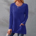 Detail view of deep blue long sleeve tunic showing round neck and side pocket features - S / Tops / Blue