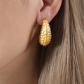 French-style teardrop earring with hammered texture and gold-plated titanium finish - Gold