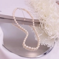 Elegant baroque freshwater pearl necklace with silver-tone lobster clasp and extension chain - Silver Rice Pearl