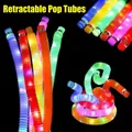 Colorful LED light-up pop tubes toys for sensory play in flexible glowing plastic style - Glowing Pop Tubes