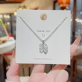 Silver titanium steel four-leaf clover necklace with white translucent gemstone petals - X020 Silver Shell Clover