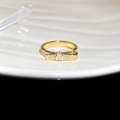 Macro shot of gold-plated crossover ring with pavé bow knot and sparkling zircon stones - Thick Ring Full Zirconia Bowknot Style (31# Gold)