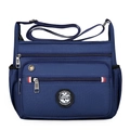 Bolso bandolera azul de nailon con múltiples bolsillos y correa ancha ajustable - Azul