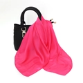 Magenta satin silk scarf elegantly tied to a black handbag handle as a stylish accessory - One Size / Faux Silk Satin / Rose Pink