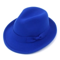 Detail shot of a bright blue wool felt fedora hat with a matching ribbon bow decoration - Sapphire Blue