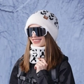 Beige knitted beanie and scarf set with geometric patterns and leather logo patch - Creamy White