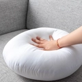 White round floral throw pillow in soft plush fabric with elastic foam compression - Round Pillow Core
