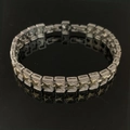 Bracciale geometrico bicolore con stelle dorate e maglie pavé per un look di tendenza - Bracciale a Stella Bicolore SL574