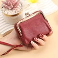 Red lychee texture leather coin purse with golden clasp and wrist strap detail - Red