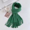 Detail of emerald green cashmere-feel scarf showing soft knit texture and long tassels - Regular Fit / Emerald Green