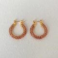 Chic golden hoop earrings paved with sparkling pink zircons for a trendy fashion look - Pink