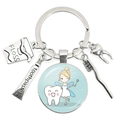 Tandheelkundige sleutelhanger met flosdraad, tandpasta, tandenborstel en hanger - Cartoon Tandarts Fee en Tand