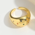 Macro detail of gold open ring featuring colorful inlaid gemstones on polished metal - Colorful Zirconia Style(JZ0507)