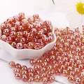 Detailed view of 8mm pink iridescent acrylic round beads in a flower bowl for DIY jewelry - 8mm (100pcs/Pack) / Red