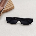 Classic black cat-eye sunglasses with rectangular resin frames and UV400 protection - Black