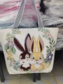 White canvas tote bag featuring cute cartoon rabbit prints and striped handles - Double Rabbits