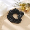Glossy black PU leather scrunchie with elegant folds for a stylish hair accessory - Black