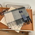 Plaid cashmere-feel scarf in beige and grey blend with fringe trim on wooden tray - 16# Tri-Grey Plaid