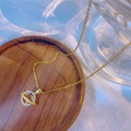 Goud Saturnus Zirkonia