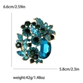 Elegante broche de cristal dorado con pedrería azul, 6.6x5.8cm, peso 42g - Azul