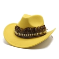 Detail of yellow wool cowboy hat with brown feathers and golden skull metal ornaments - Yellow
