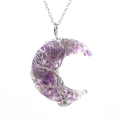 Macro view of silver tree of life wire-wrapped amethyst crescent moon pendant necklace - Amethyst Tree of Life Moon Necklace