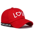 Red canvas baseball cap with white LOVE embroidery and side ribbon detail - Adjustable / Red